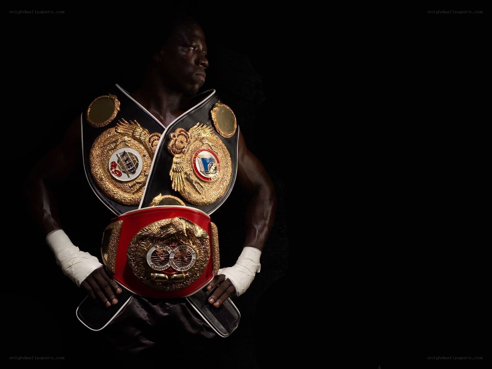 boxer with championship belts