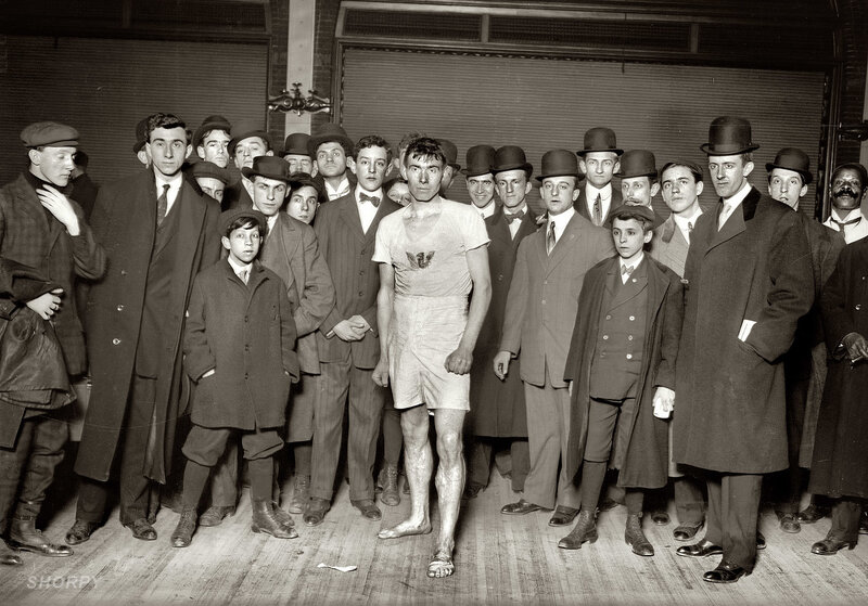 Boxer with crowd after match