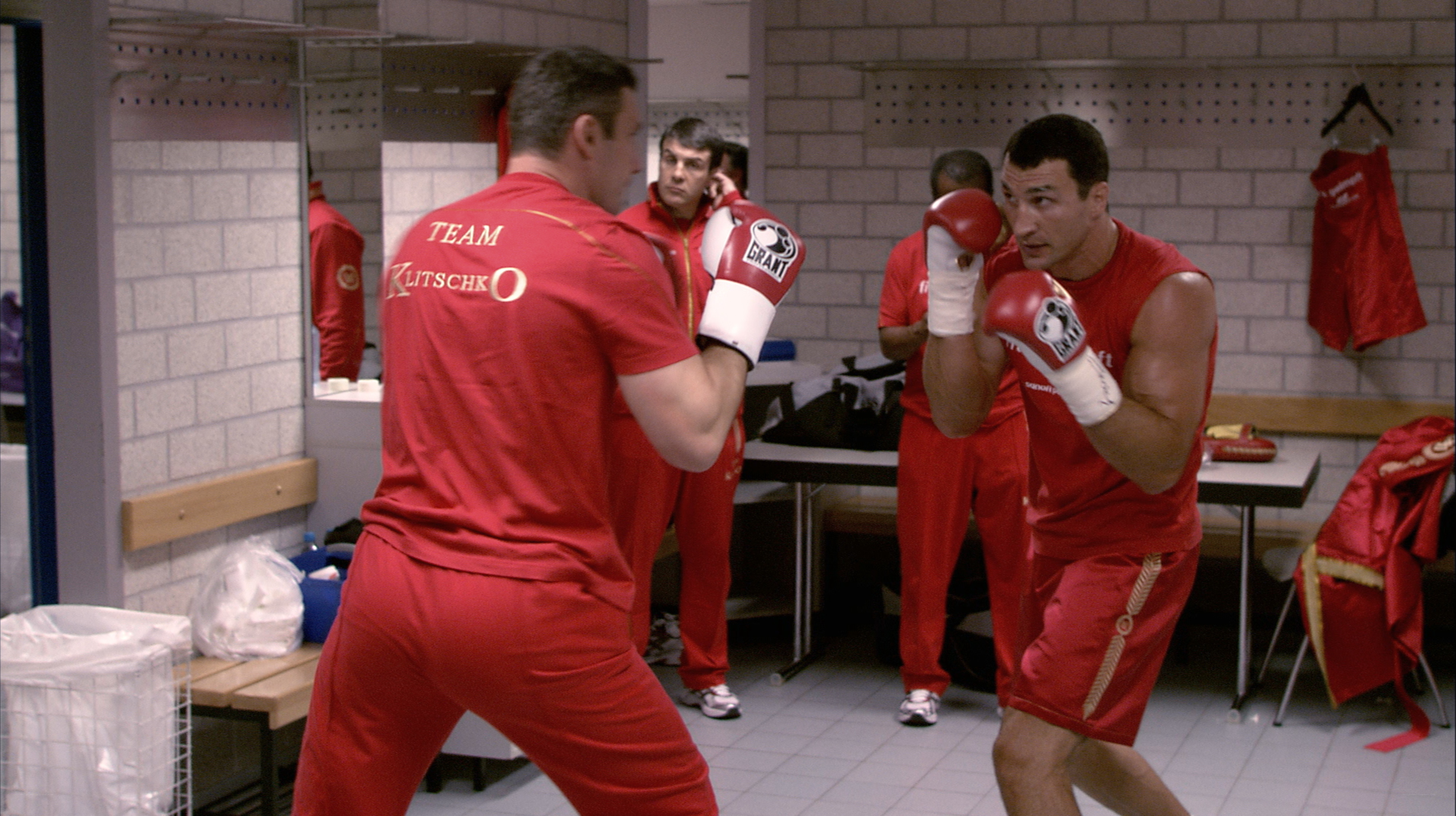 Boxers training in locker room
