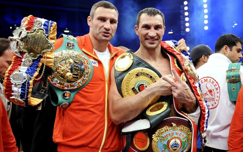 Boxers with championship belts