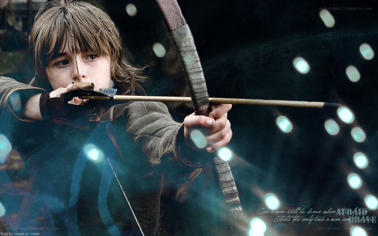 boy aiming a bow