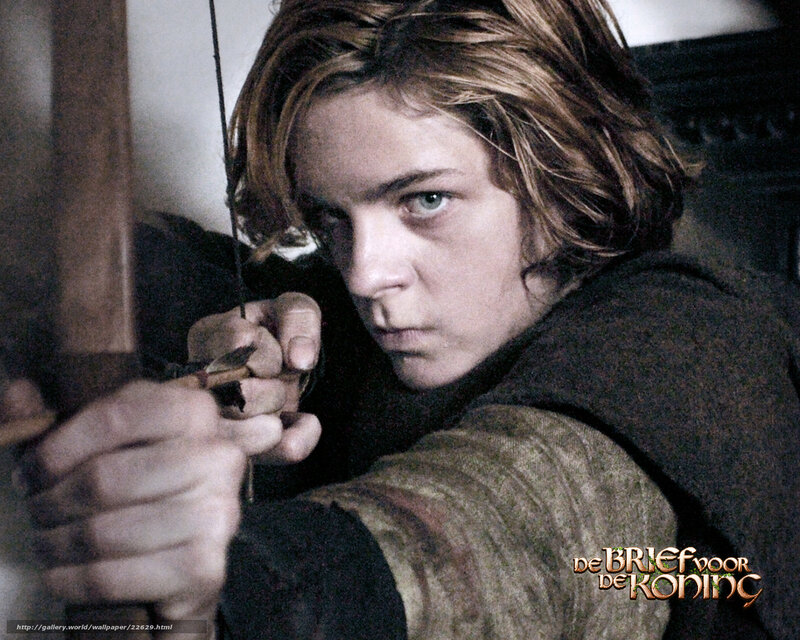 boy aiming bow and arrow