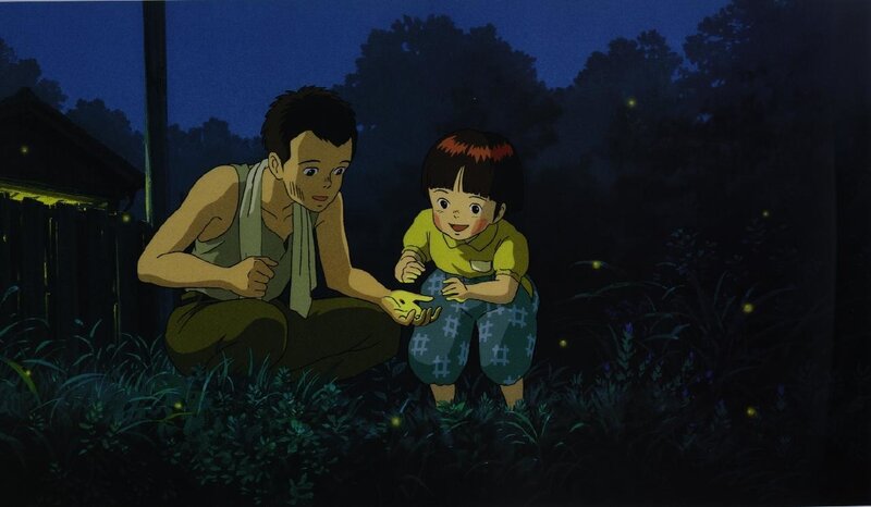 boy and child watching fireflies