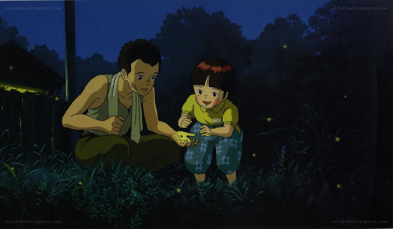 boy and child watching fireflies