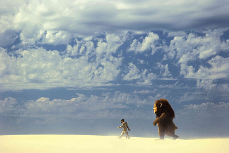 boy and creature in desert