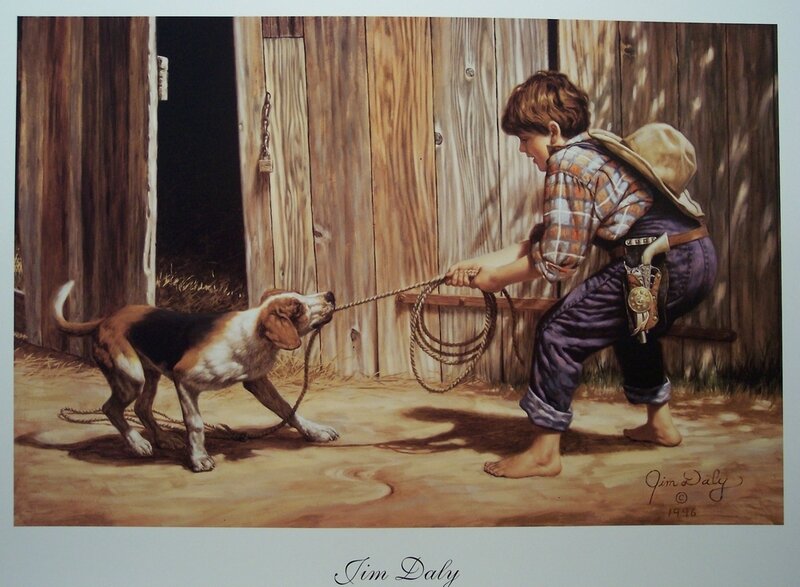 Boy and dog by barn