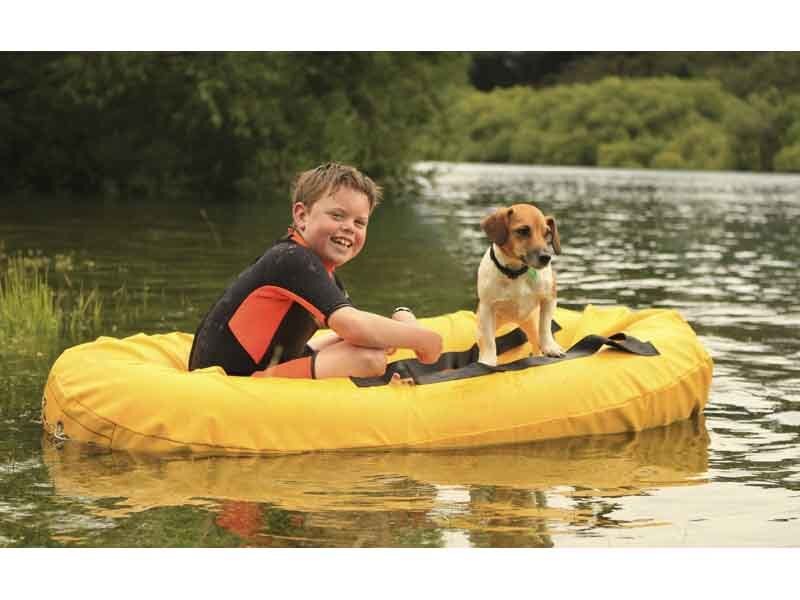 Boy and Dog in Raft