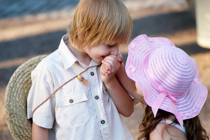 Boy and Girl Holding Hands — White, Intimate