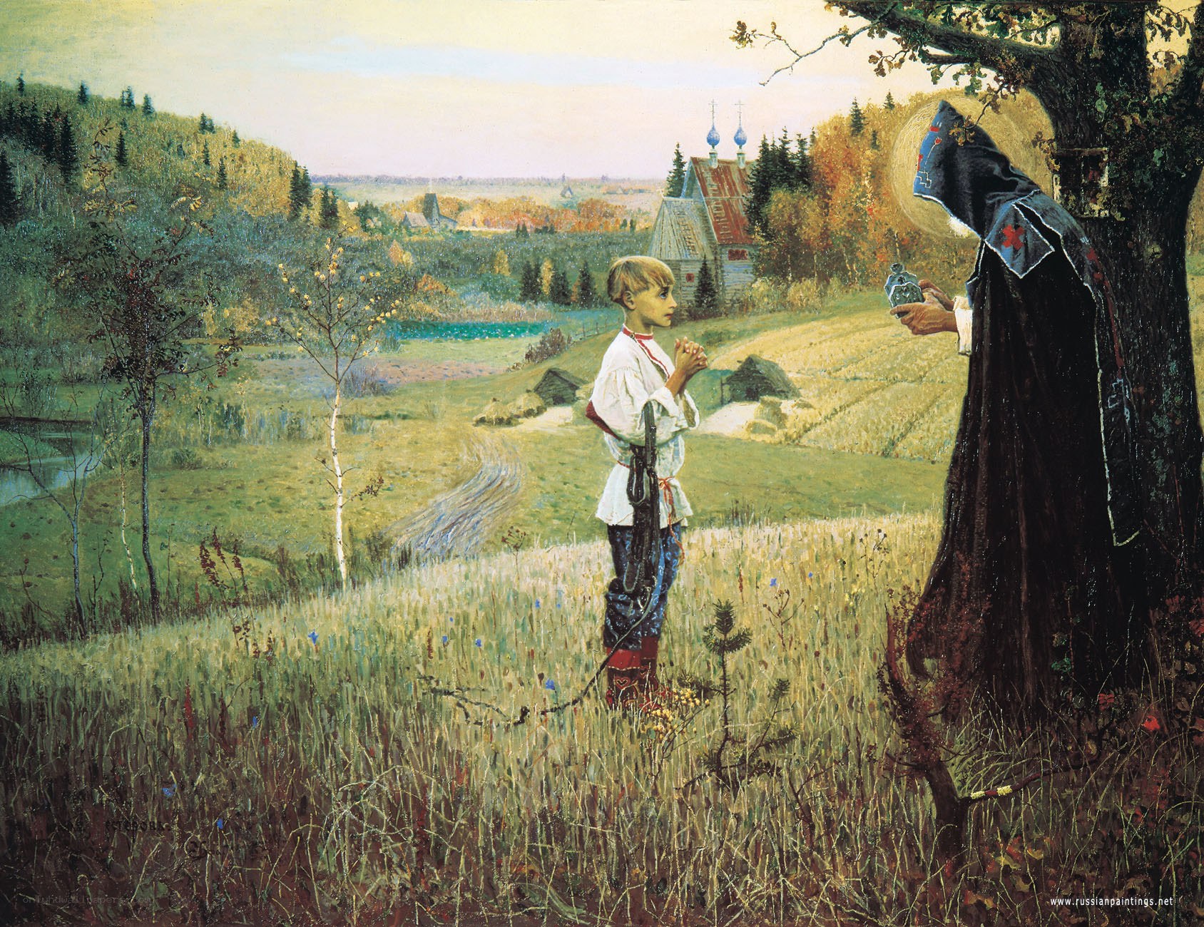 Boy and monk in a field