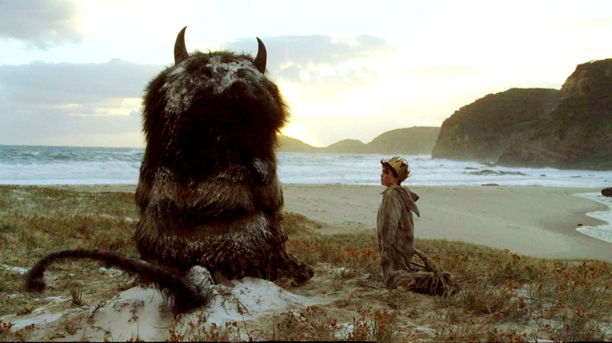 boy and monster on a beach