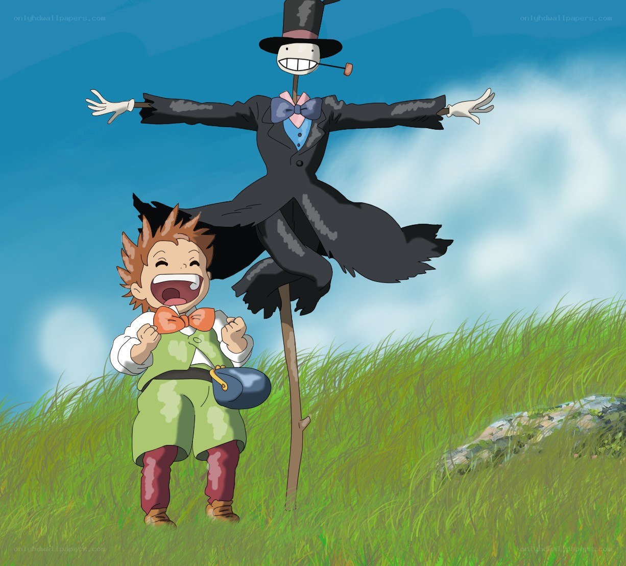 boy and scarecrow in a field