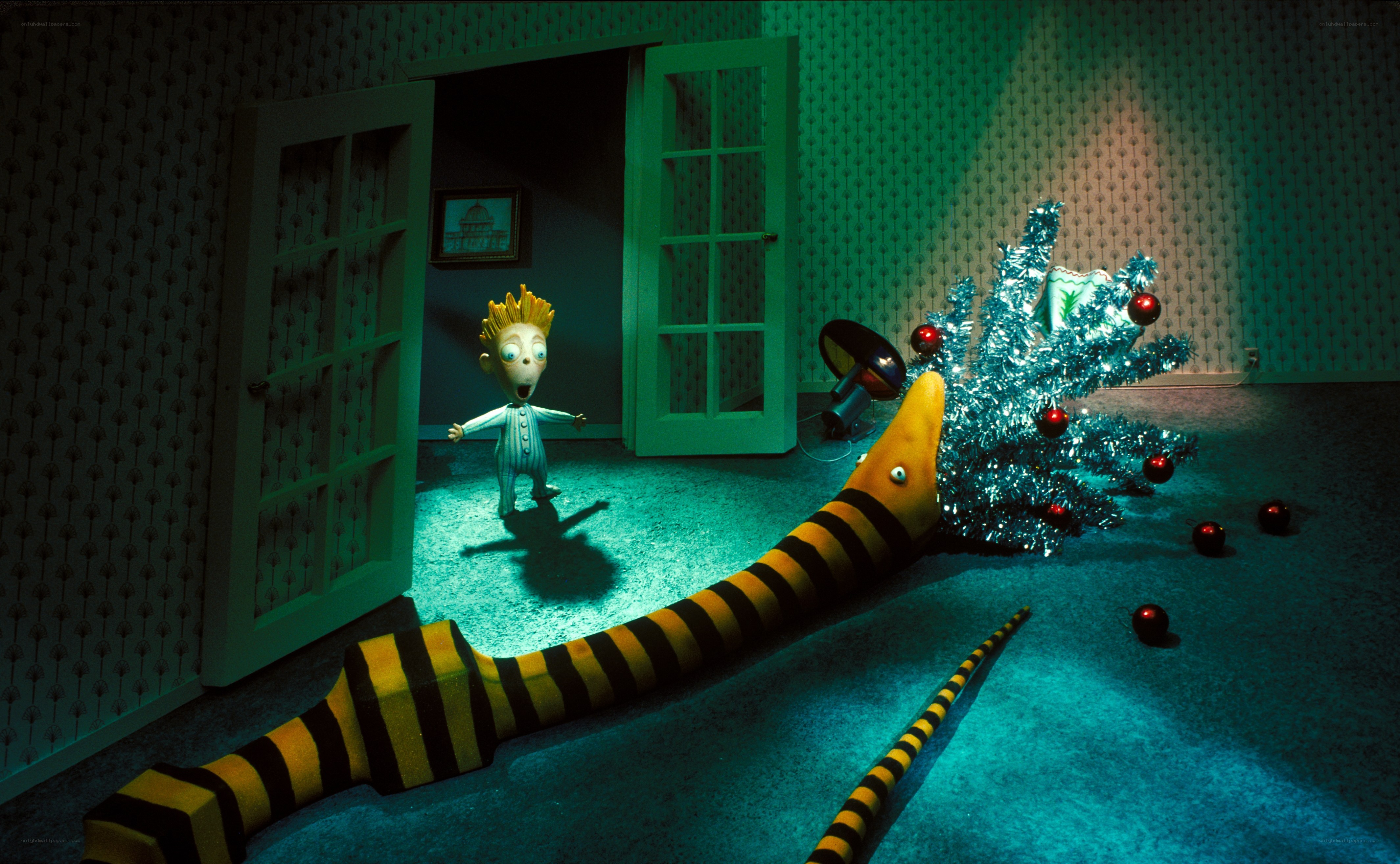 Boy and striped creature in room