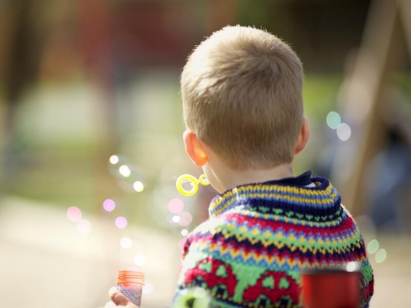 Boy Blowing Bubbles — Green