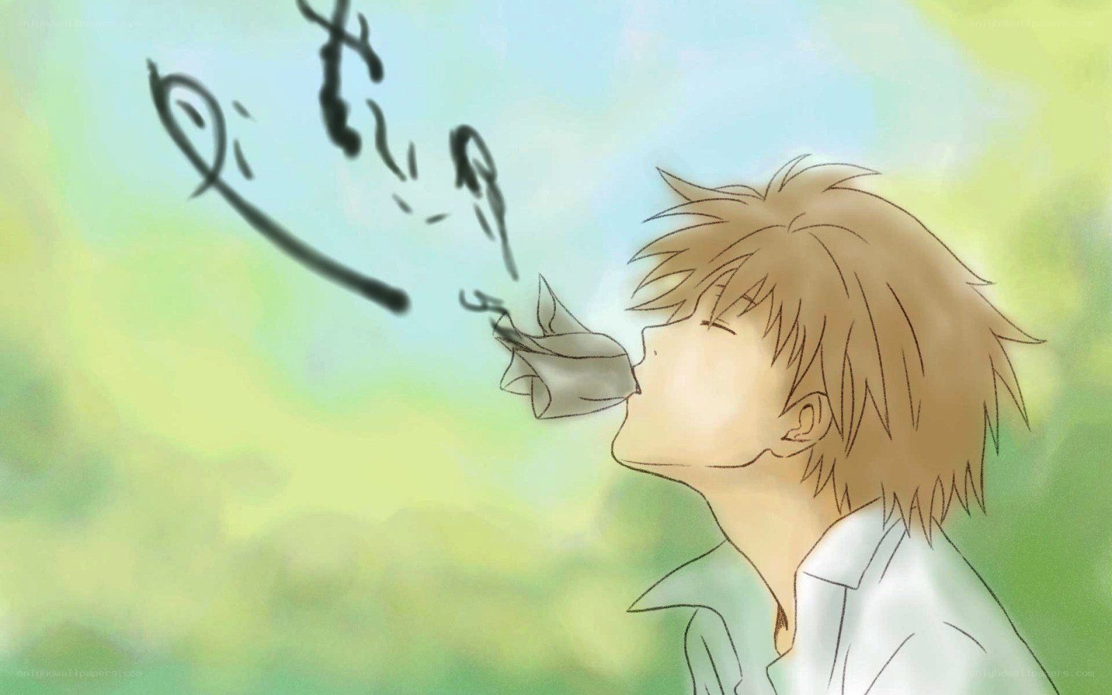 boy blowing paper airplane