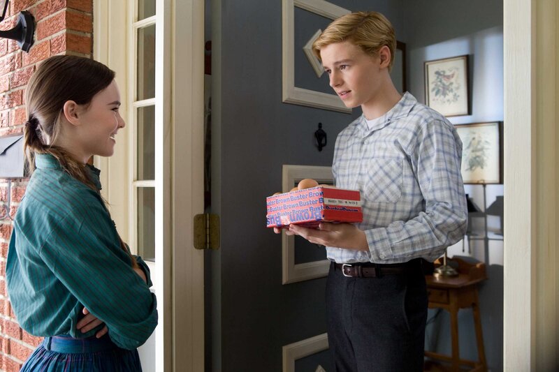 Boy delivering eggs to girl
