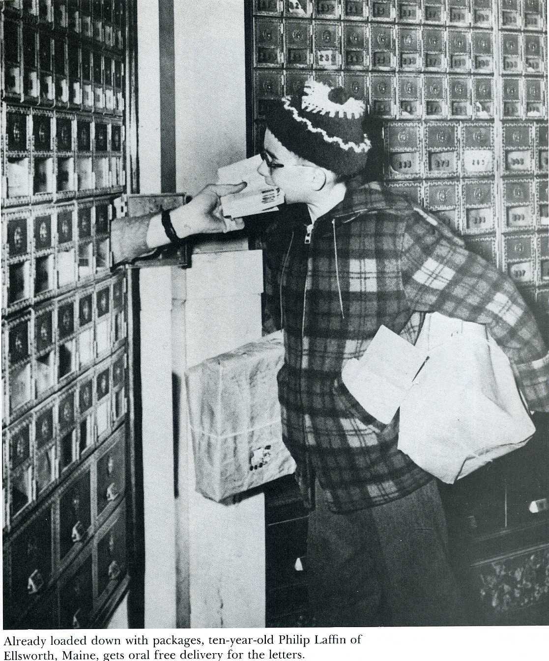 Boy delivering mail at post office