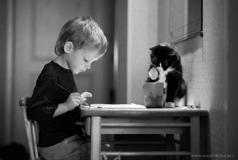 Boy Drawing at Table — Black