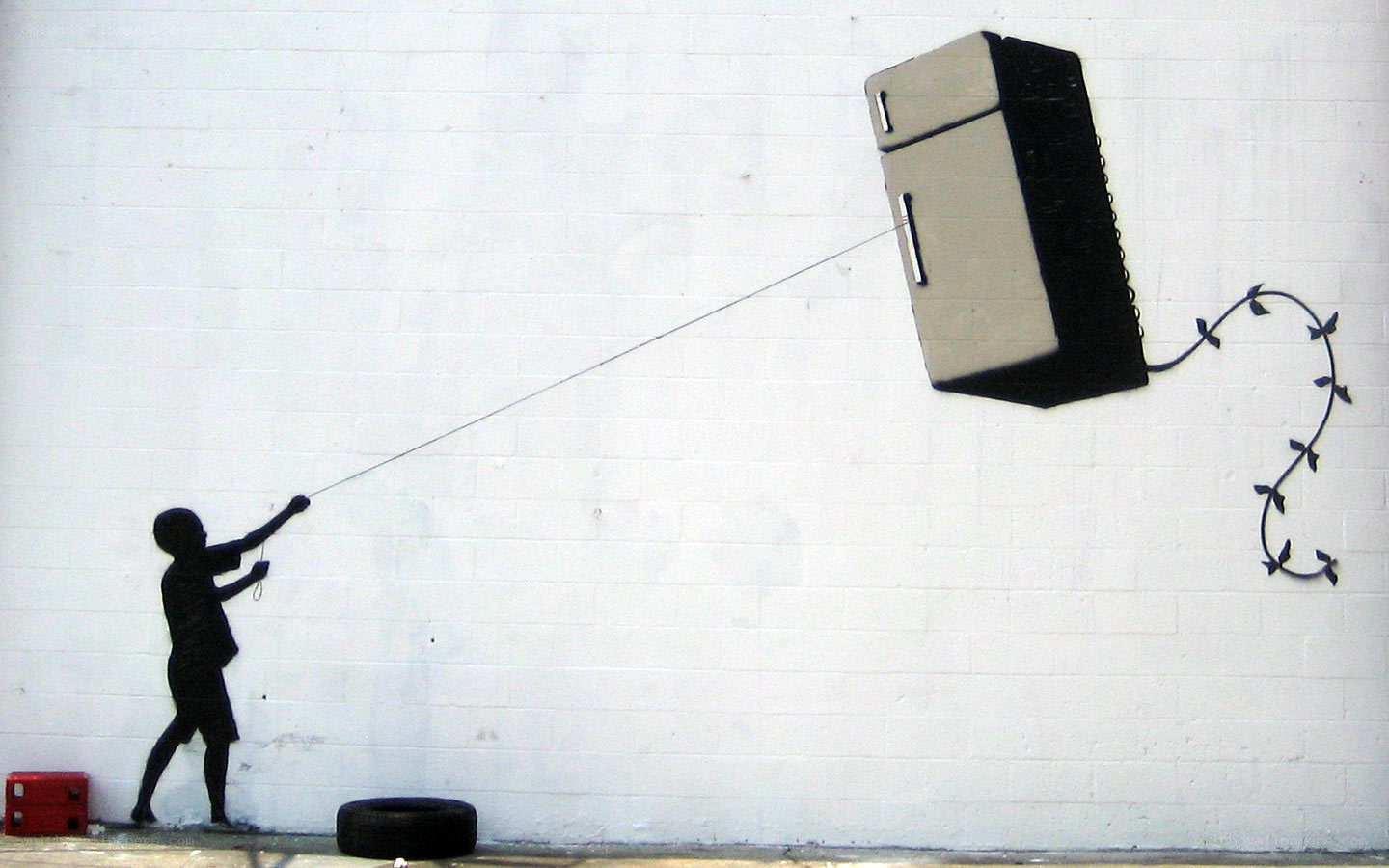 Boy flying a refrigerator kite
