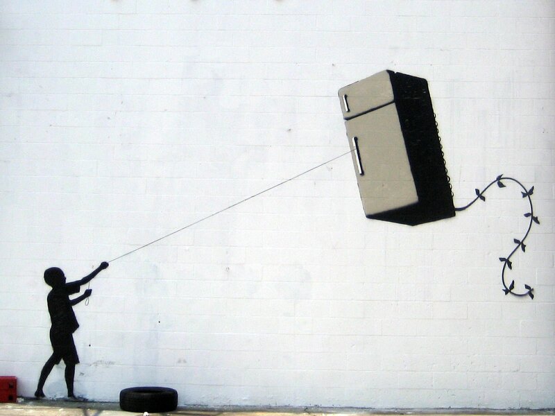 Boy flying a refrigerator kite