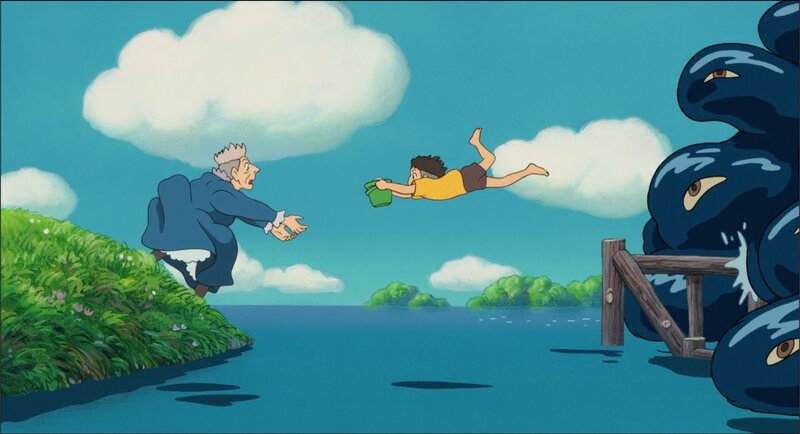 Boy flying over water