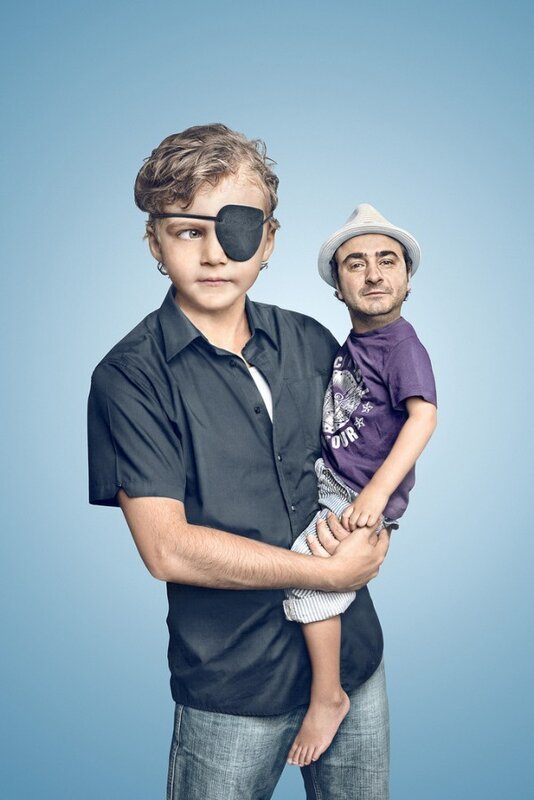 boy holding a man