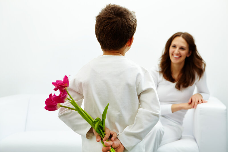 Boy Holding Flowers