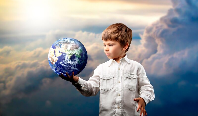 Boy Holding Globe — Blue, Dramatic, Sunrise