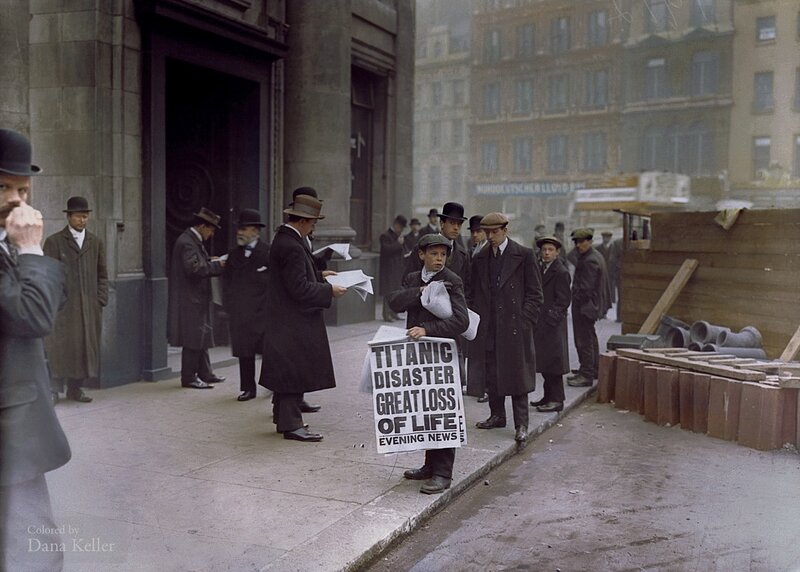 Boy Holding Sign on Street