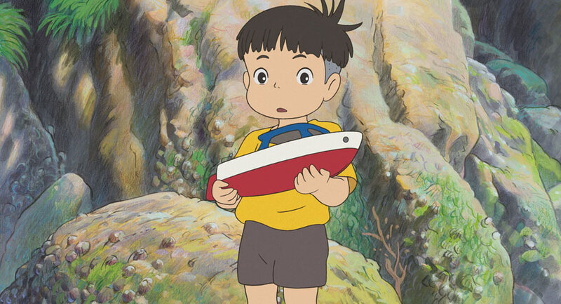 Boy Holding Toy Boat — Yellow