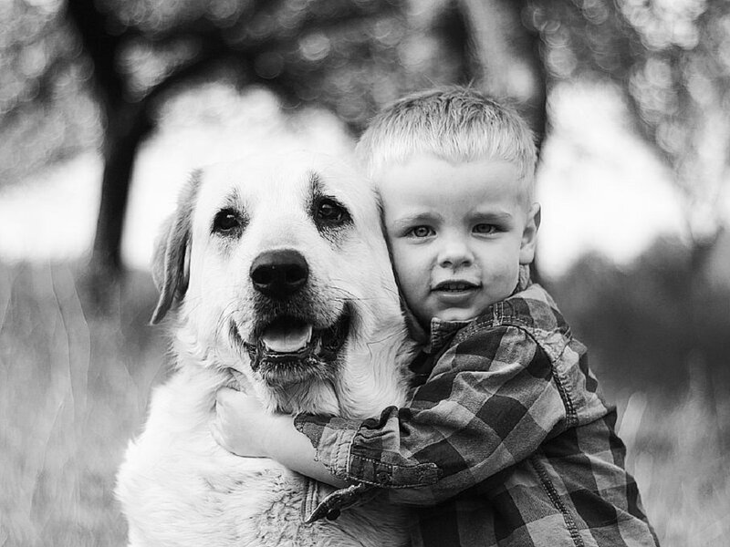 Boy Hugging Dog — Black