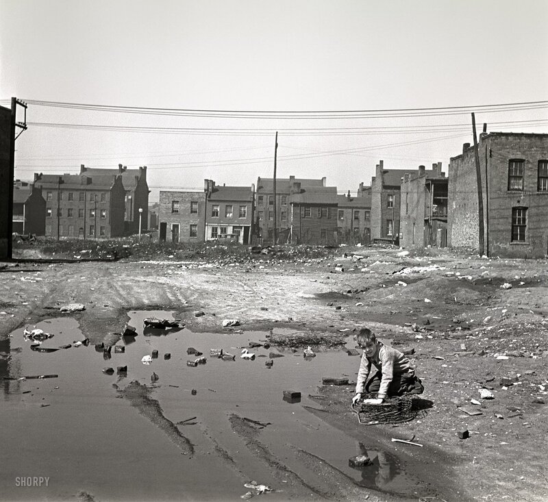 Boy in a vacant lot