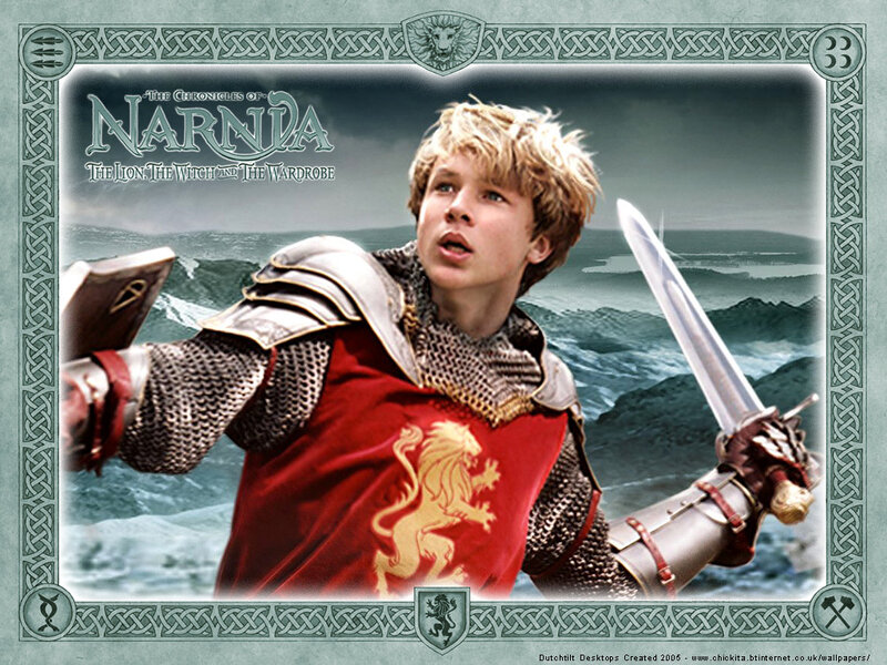 Boy in Armor Holding Sword