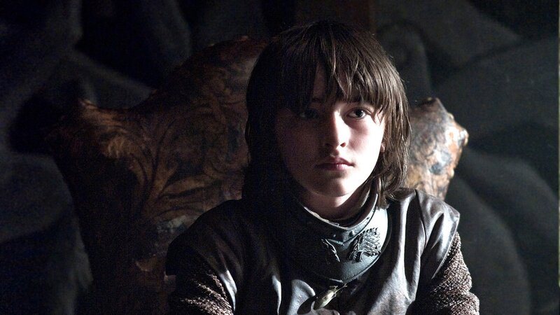 boy in armor on throne