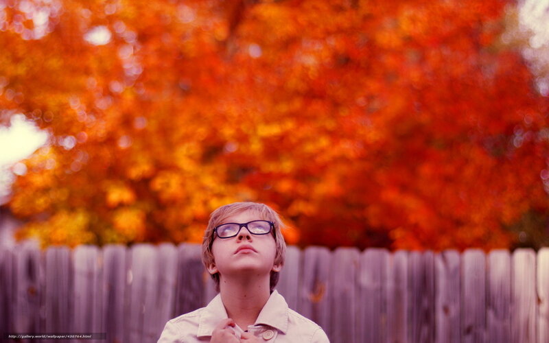 boy in autumn with glasses