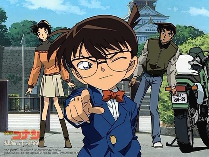 Boy in Blue Suit Pointing