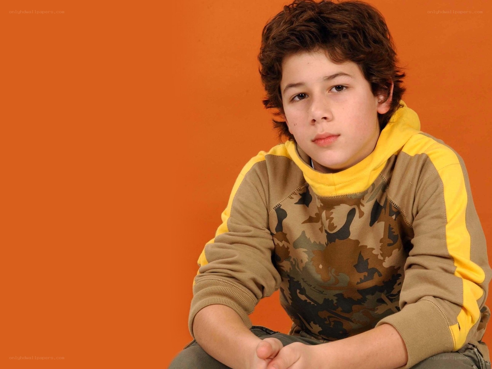 boy in camouflage hoodie
