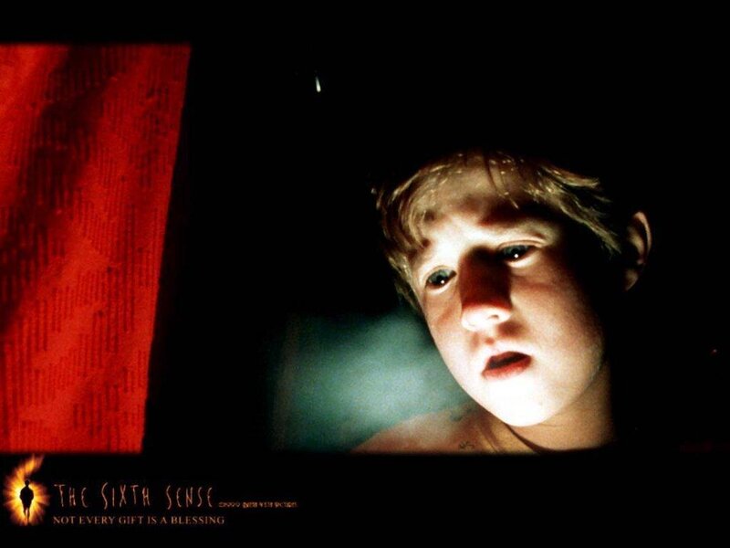 Boy in Dark Room