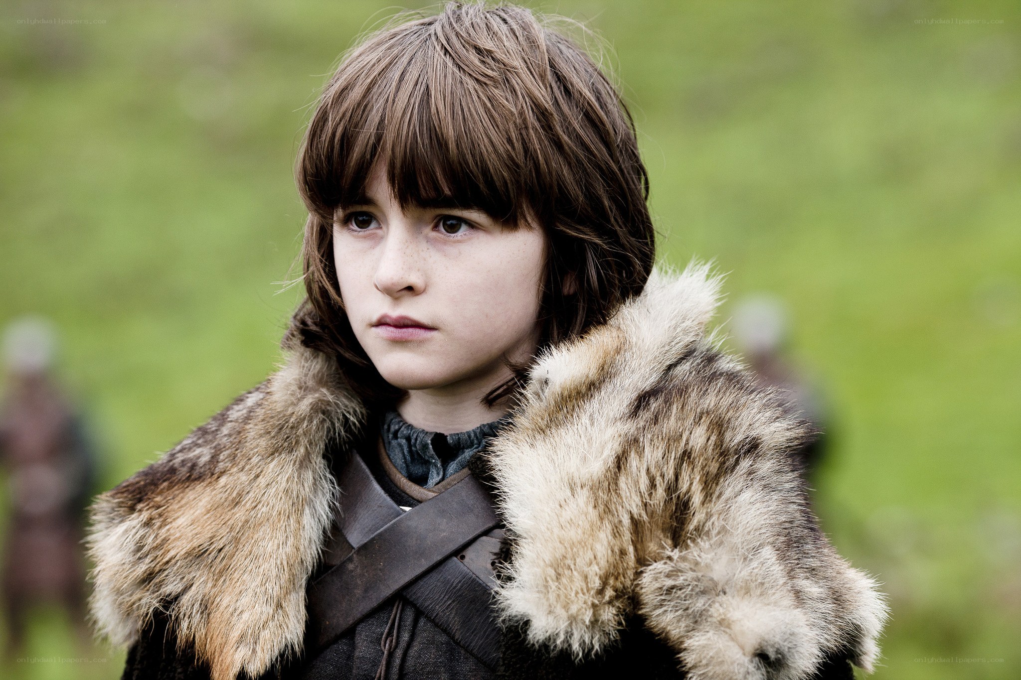 boy in fur-lined cloak