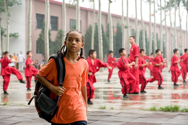 Boy in Orange Shirt