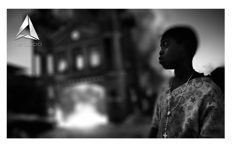 Boy in profile with building background