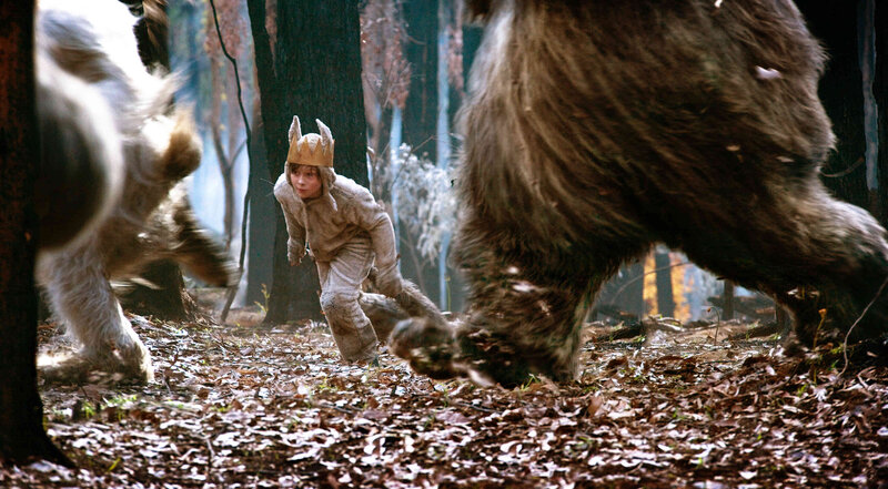 Boy in wolf costume running