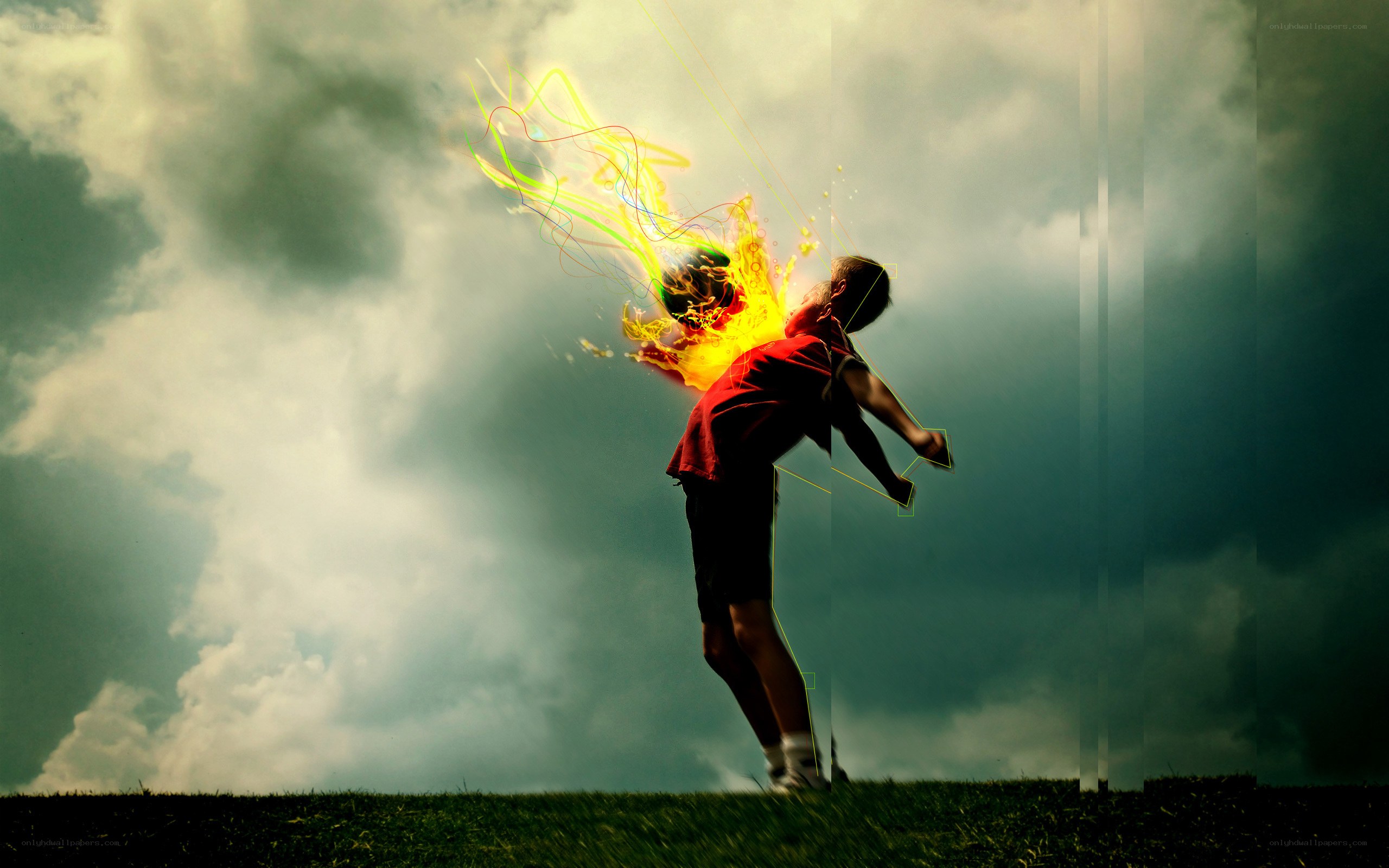 Boy kicking fiery ball