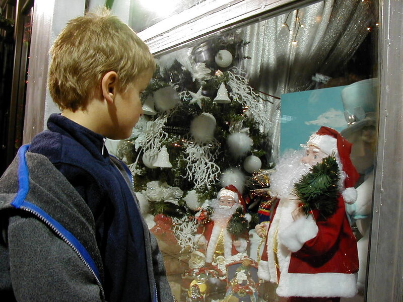 Boy Looking at Window Display