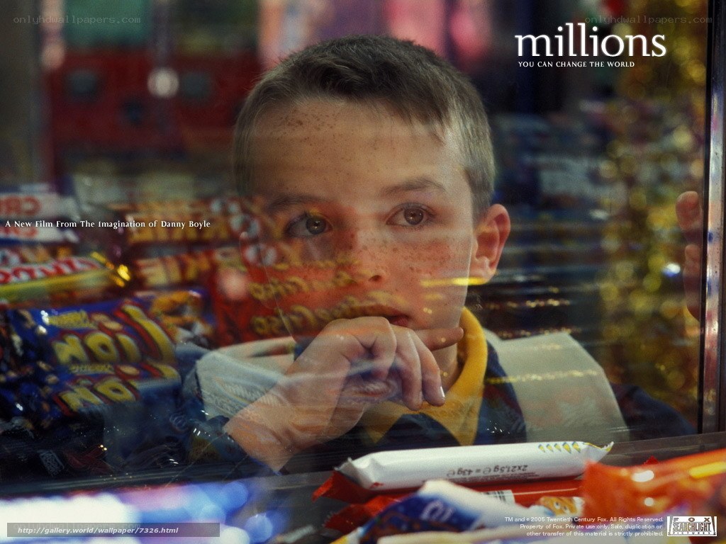 Boy looking through candy store window