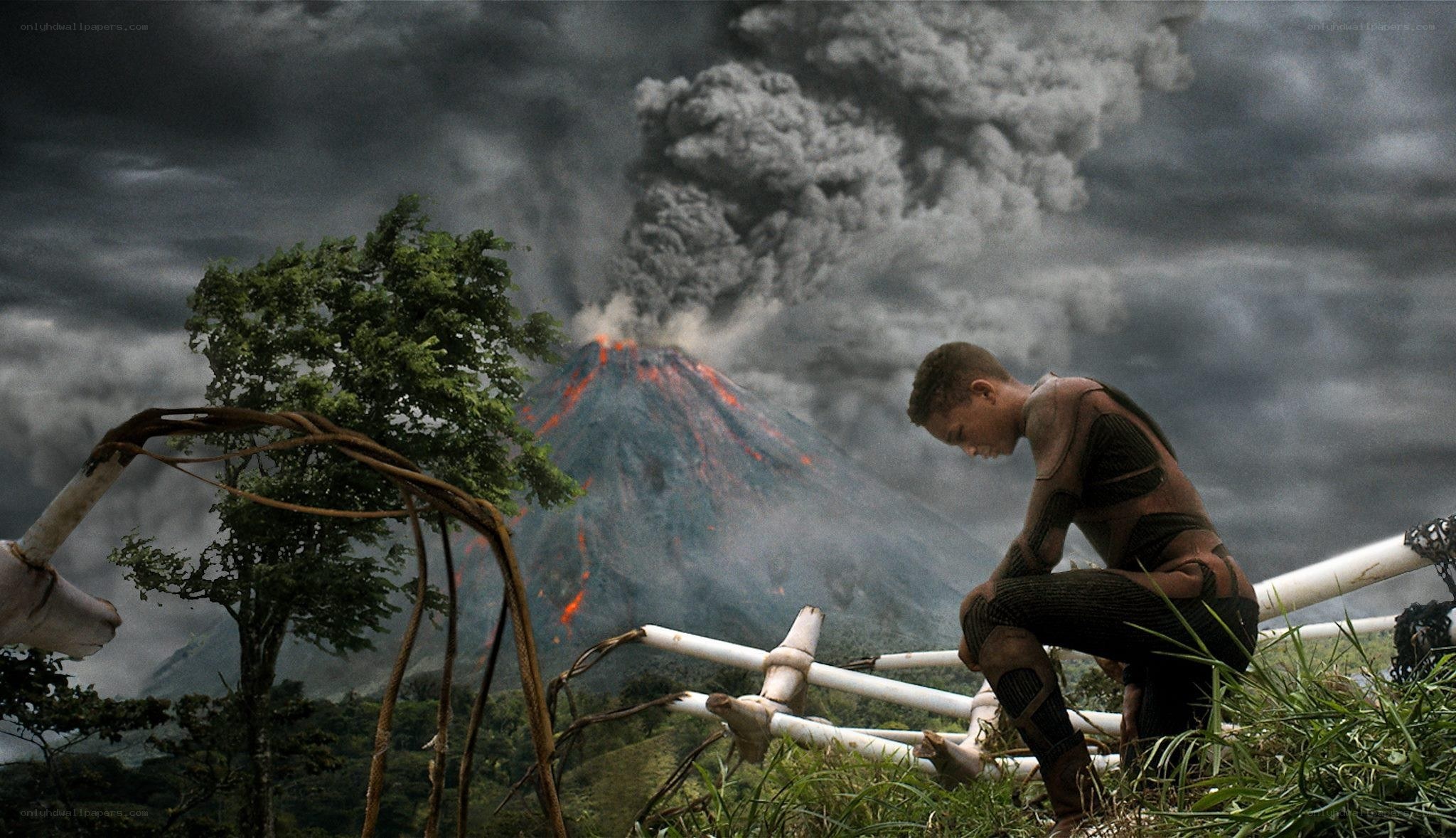 Boy near erupting volcano