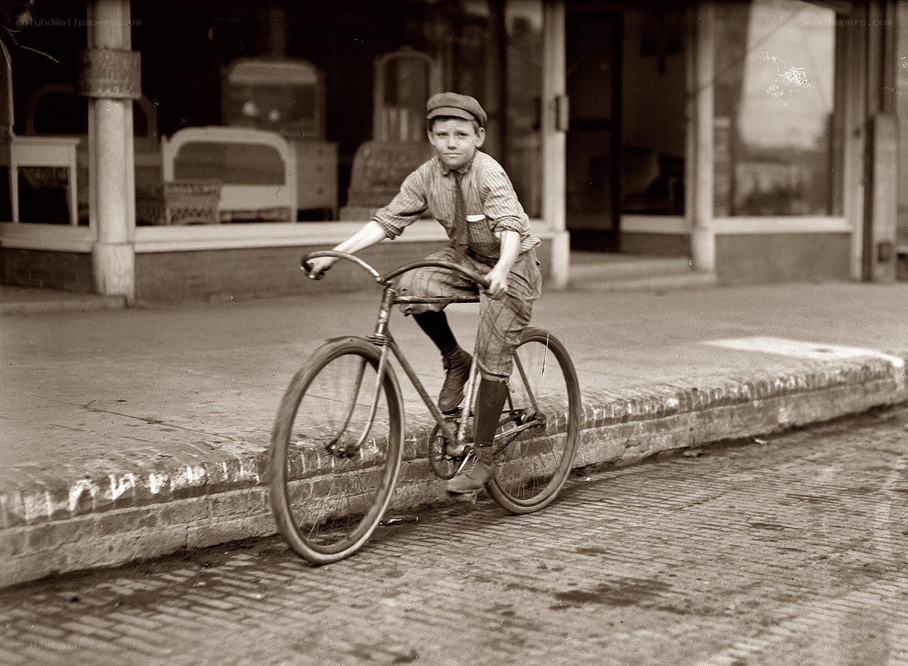 Boy on a bicycle in the city