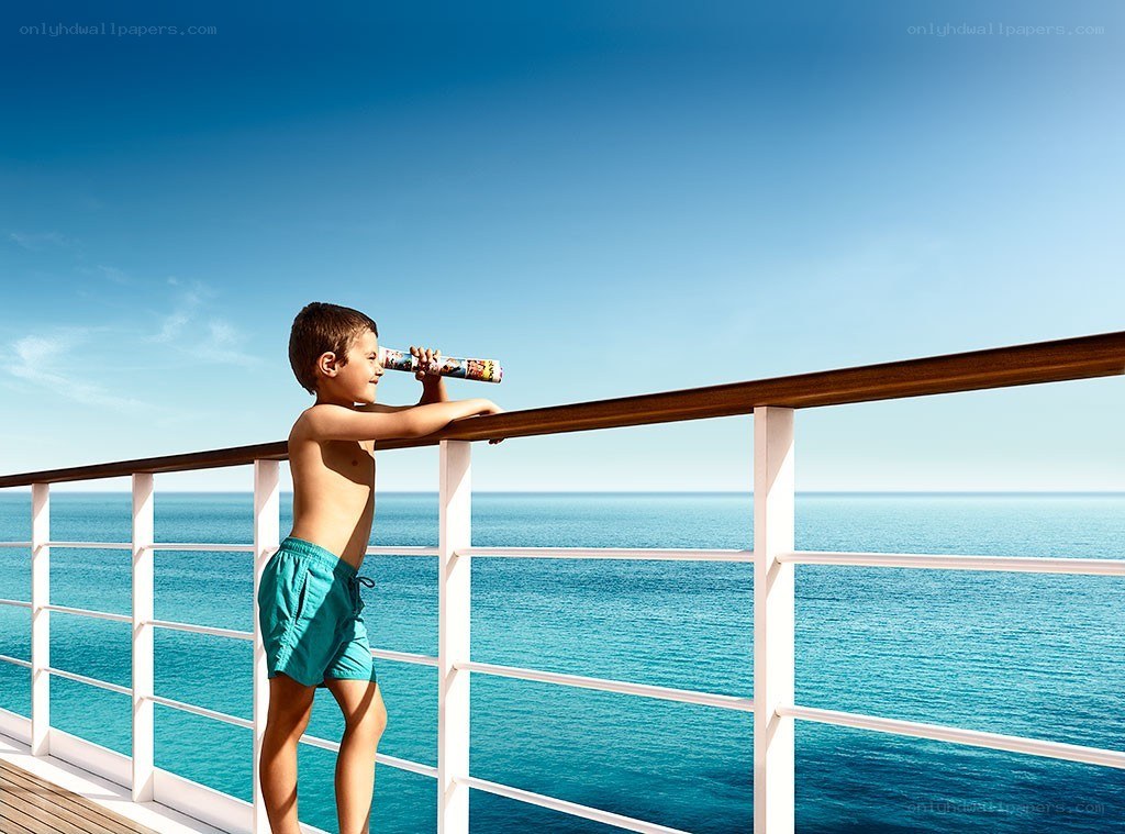 Boy on cruise ship deck