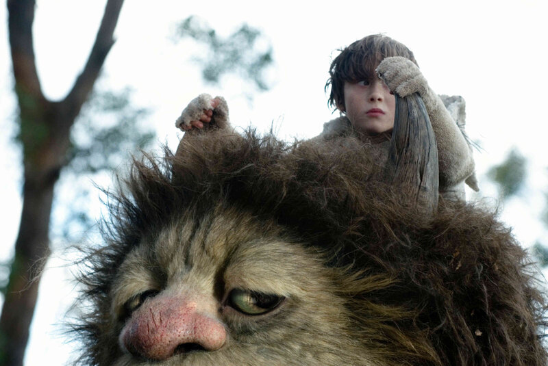 boy on monster's back