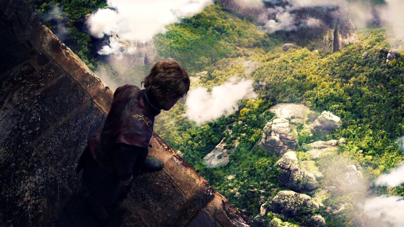 Boy on Stone Ledge
