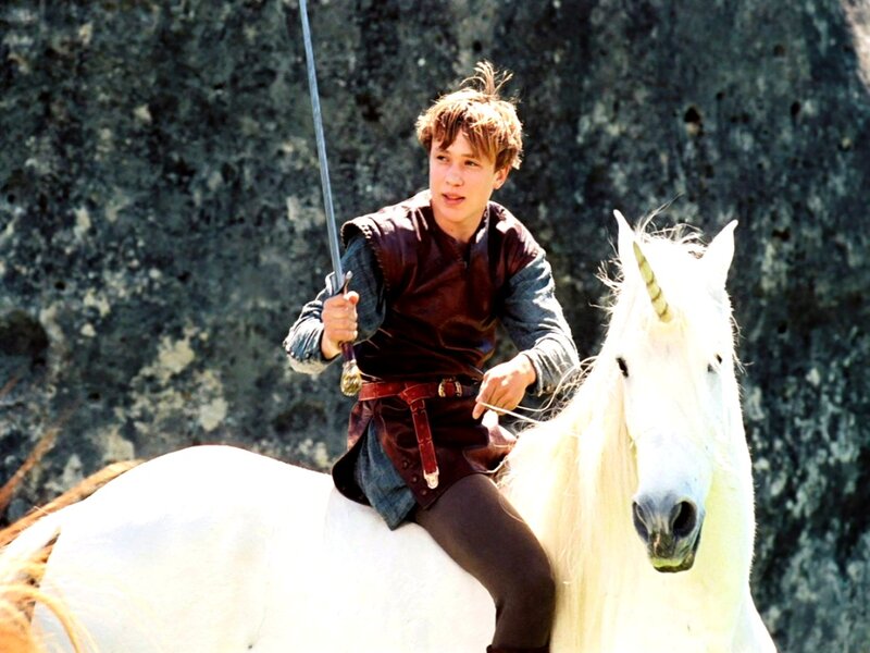 Boy on White Unicorn
